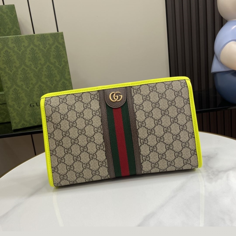 G*u*i clutch bags